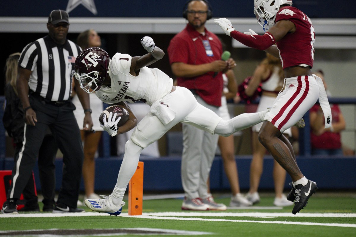 Texas A&M Aggies wide receiver Evan Stewart scores a touchdown against the Arkansas Razorbacks. 
